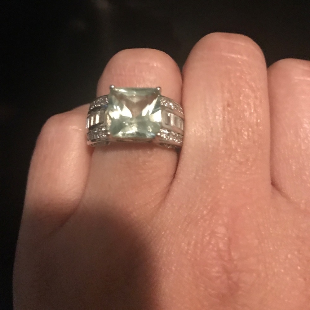 Sterling silver peridot ring with CZ. Size 7